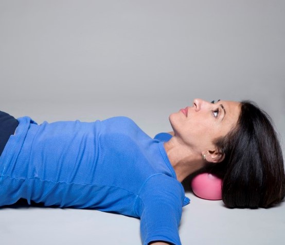 Miracle Ball Method - Elaine Petrone with neck on ball